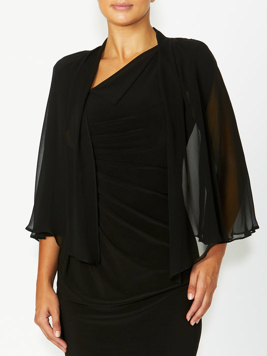 Close-up of Carrie Black Silk Shrug – A detailed look at the flowing chiffon sleeves and open-front drape, highlighting the luxurious, lightweight silk fabric. The sheer effect adds a touch of glamour, making it a versatile layering piece.